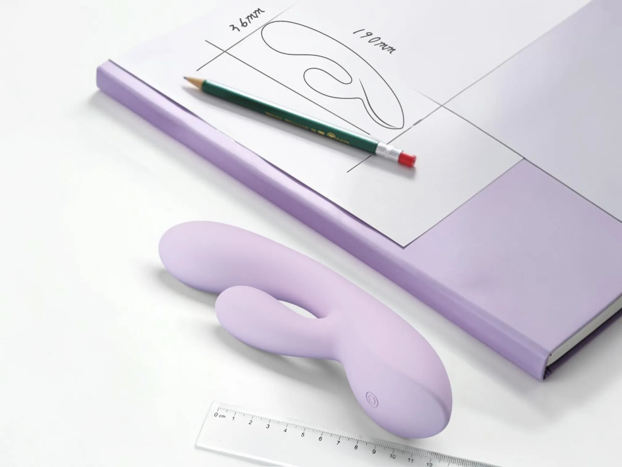 Dual motor G-spot rabbit vibrator showing curved twin-arm shape and size