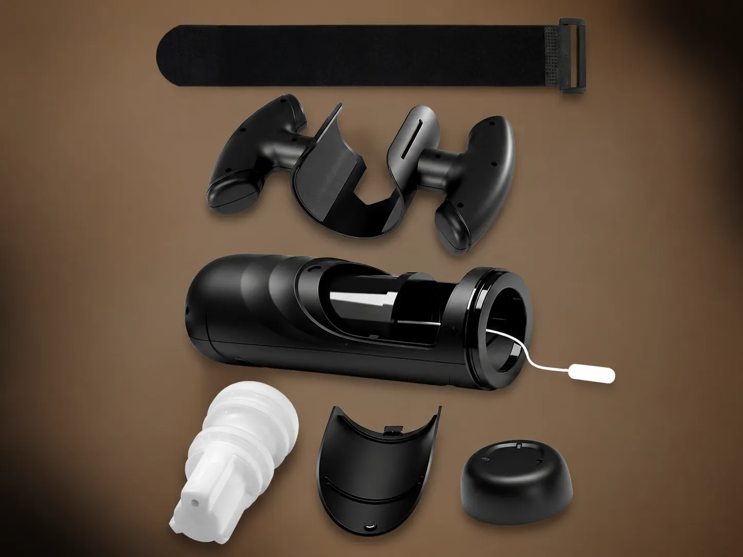 Automatic masturbator disassembled showing sleeve, handles, housing and end cap