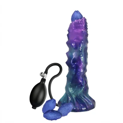 Monster dildo shown with a hand pump bulb and four soft silicone eggs arranged beside it