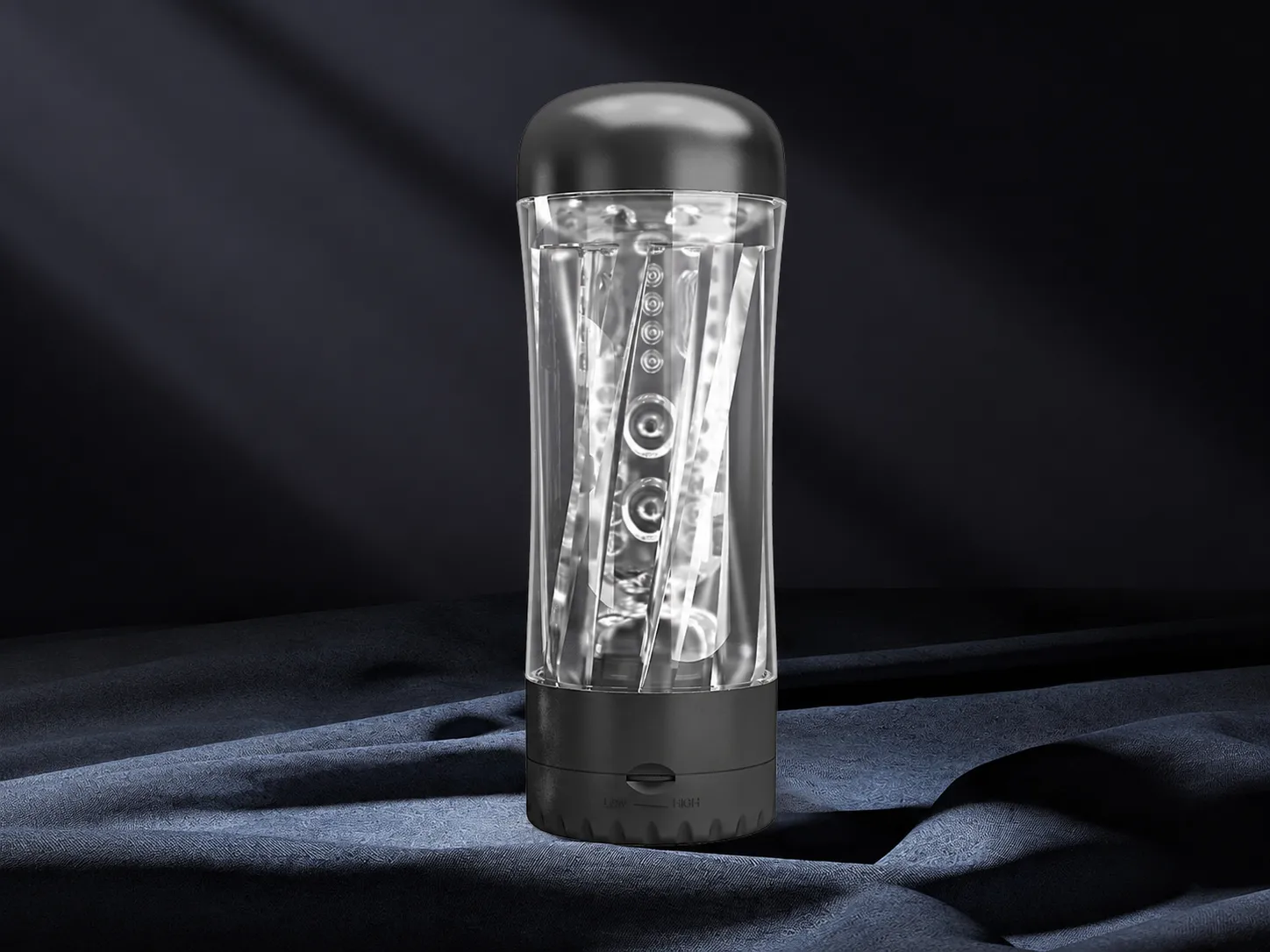 Clear masturbator cup showing the sculpted inner canal visible through the transparent outer case