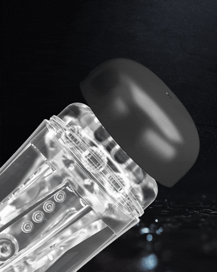 Black cap lifting off a clear masturbator cup to show its detachable construction